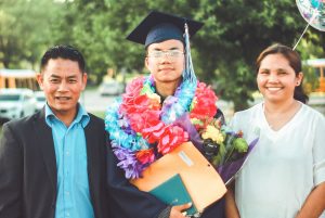 hispanic family with graduate