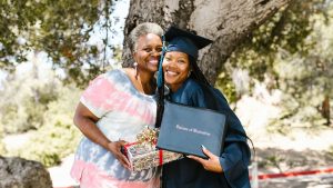 mother and graduate with diploma